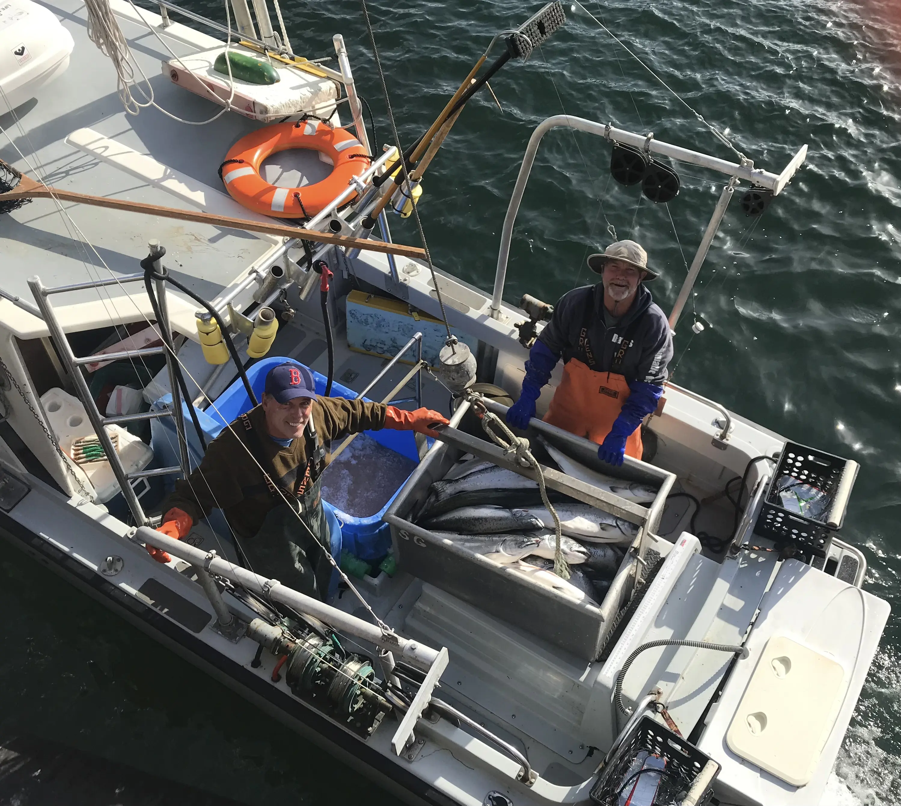 Pat & crew aboard the Long Gone with a full haul